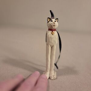 Handcrafted White and Black Cat Figurine with Red Collar